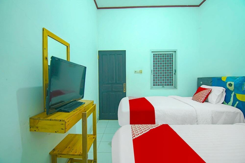 Паданг: OYO 91730 De' Mande Homestay Syariah