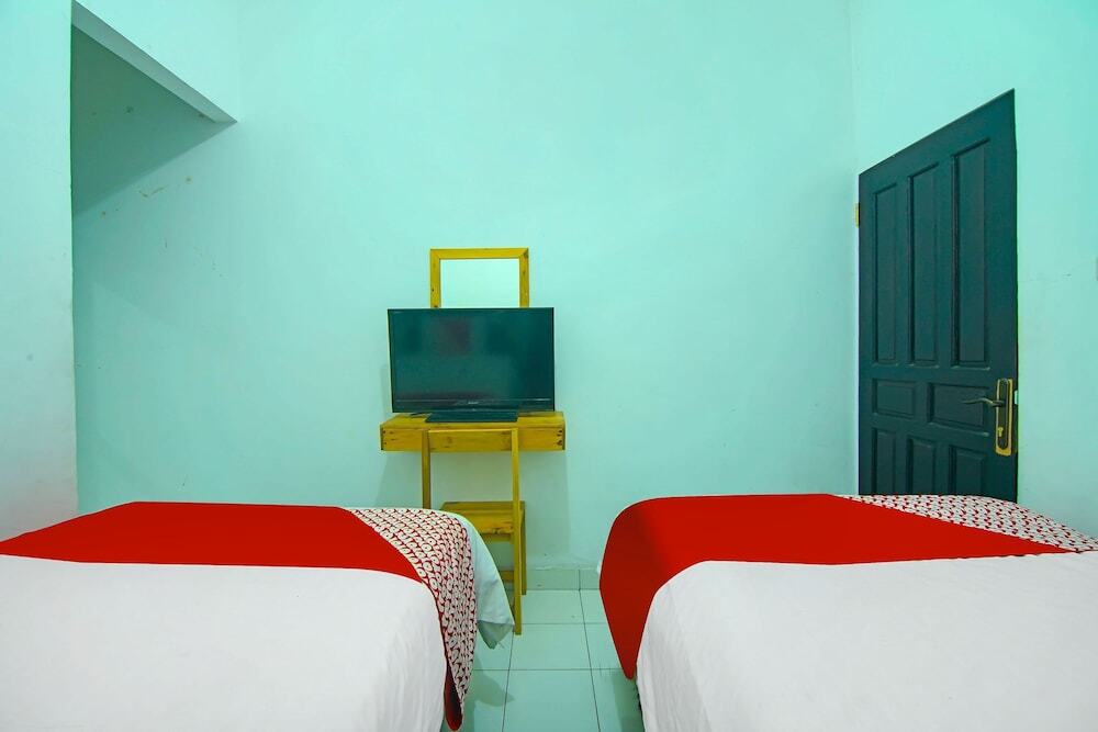 Паданг: OYO 91730 De' Mande Homestay Syariah