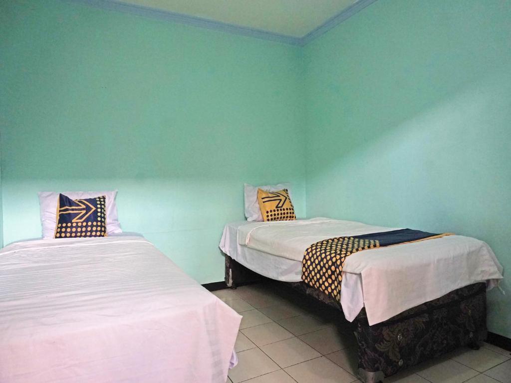 Барос: SPOT ON 91860 Amazon Homestay Syariah 2