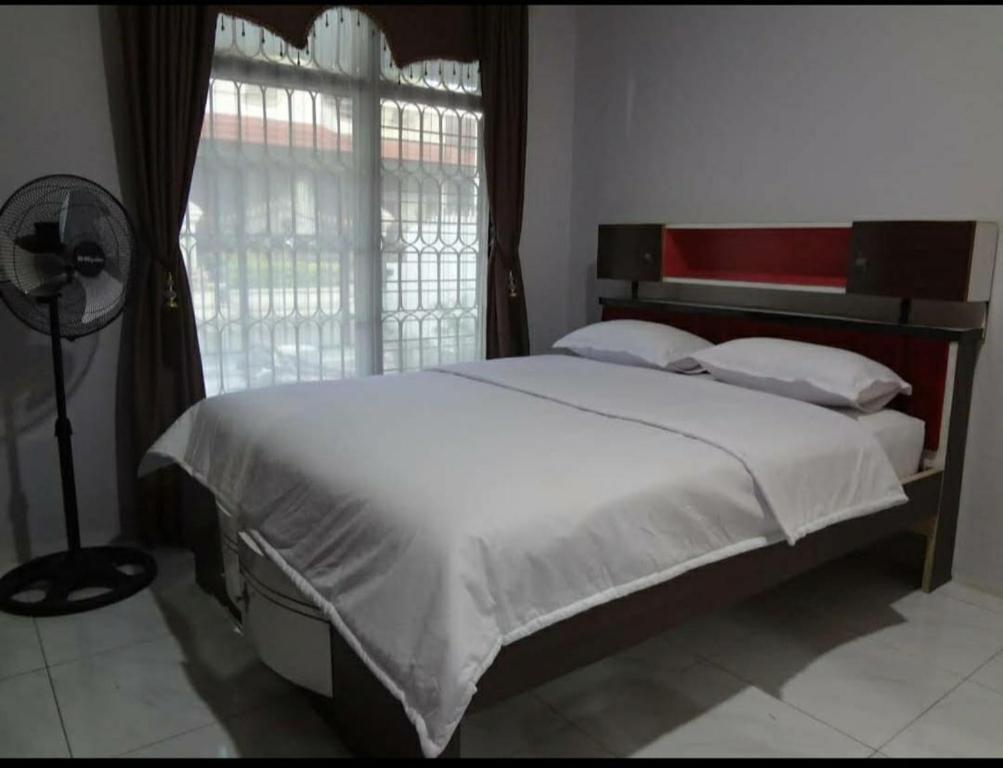 Букиттинги: Asmanida Syariah Guest House