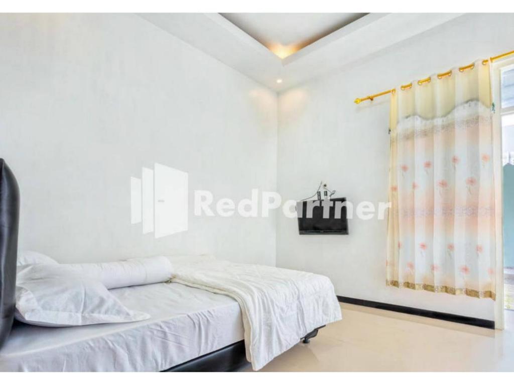 Бату: Griya Rahayu Guesthouse Redpartner Near Jatim Park 2 Batu