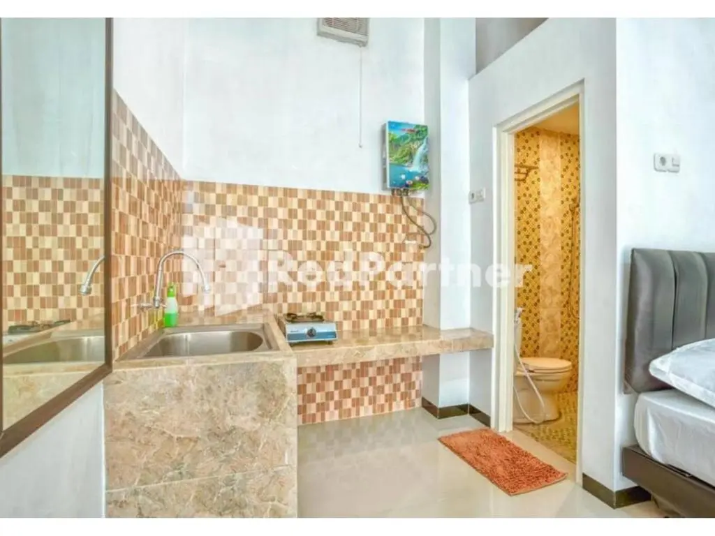 Бату: Griya Rahayu Guesthouse Redpartner Near Jatim Park 2 Batu