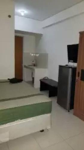 Сурабая: Apartemen Puncak Permai Tower B 14