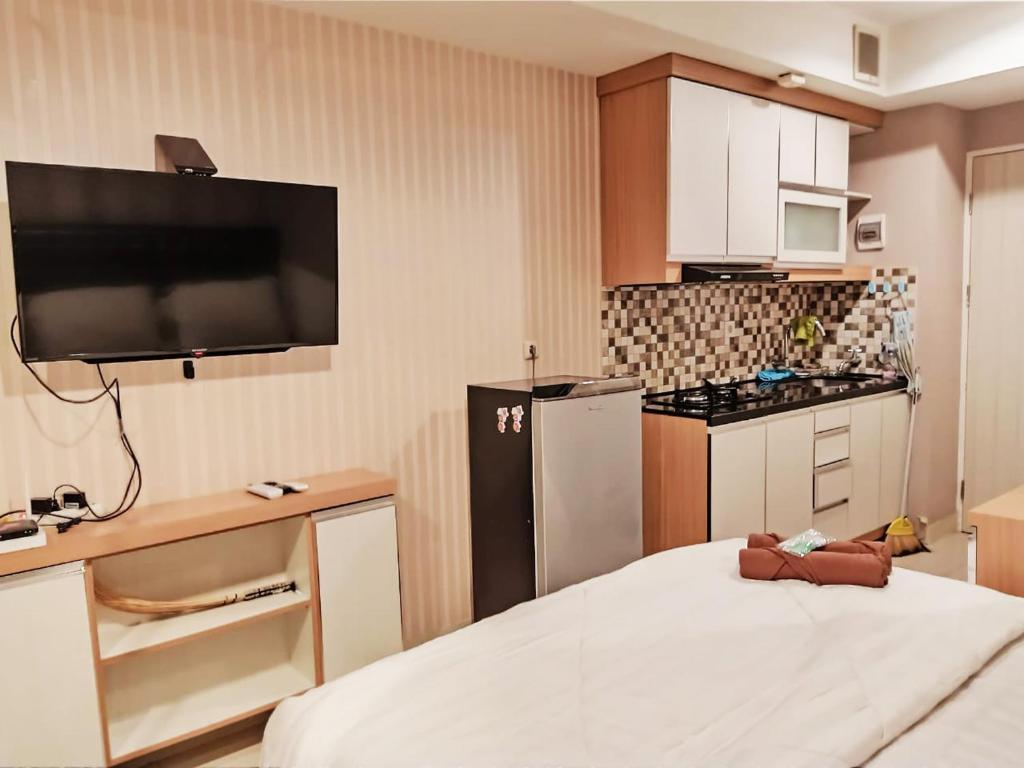 Бекаси: Apartemen grand kamala lagoon by 21 Room