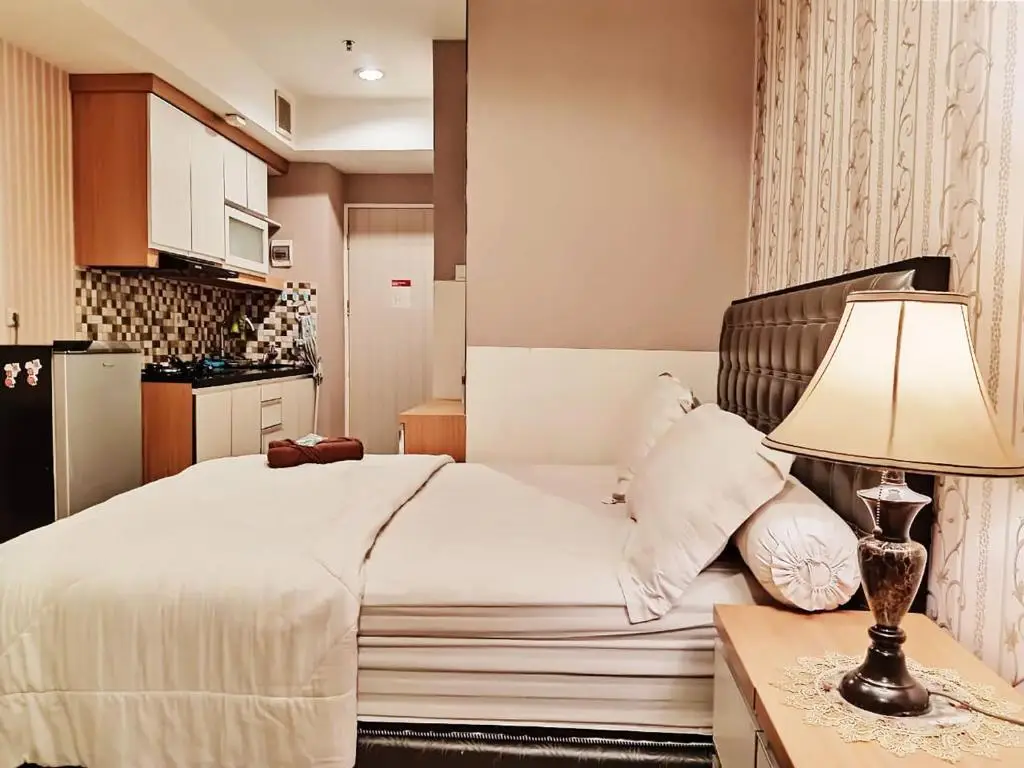 Apartemen grand kamala lagoon by 21 Room — фото 1