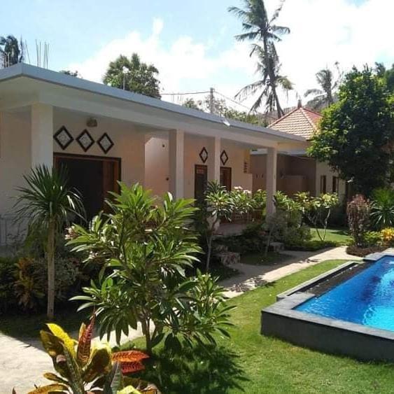 Пурвакерти: Kupu kupu Guest House