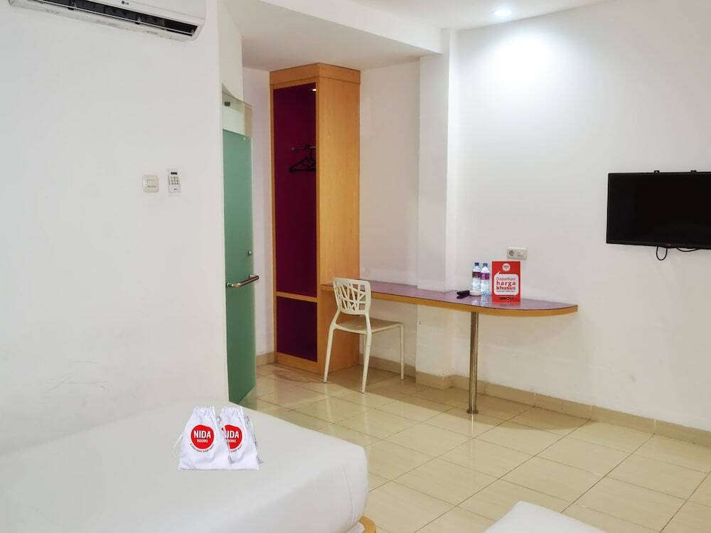 Пеканбару: Nida Rooms Tampan Universitas Riau Hr Subrantas At Mona Plaza Hotel