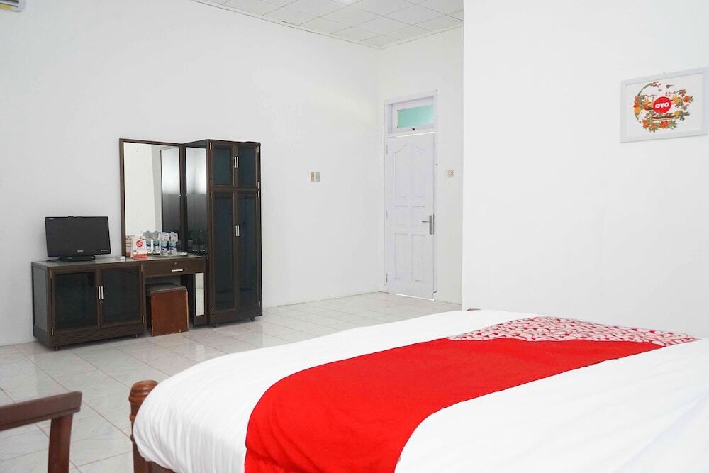 Сунгайлиате: Oyo 1148 Pelangi Hotel New Teluk Uber