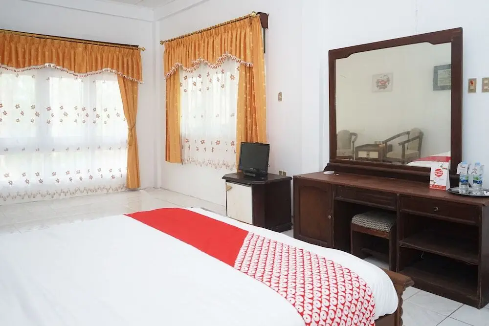 Сунгайлиате: Oyo 1148 Pelangi Hotel New Teluk Uber
