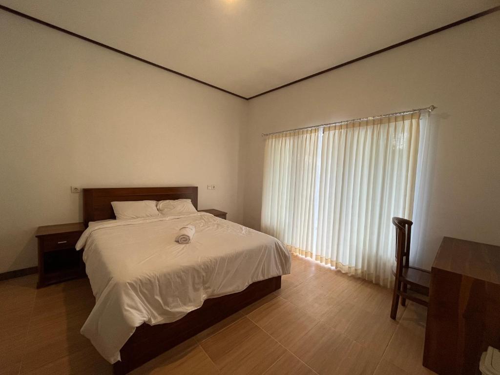 Унгасан: Purnama Homestay Pandawa