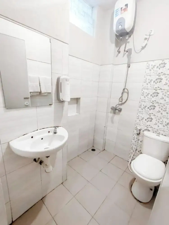 Сурабая: Kozy 15 Guesthouse