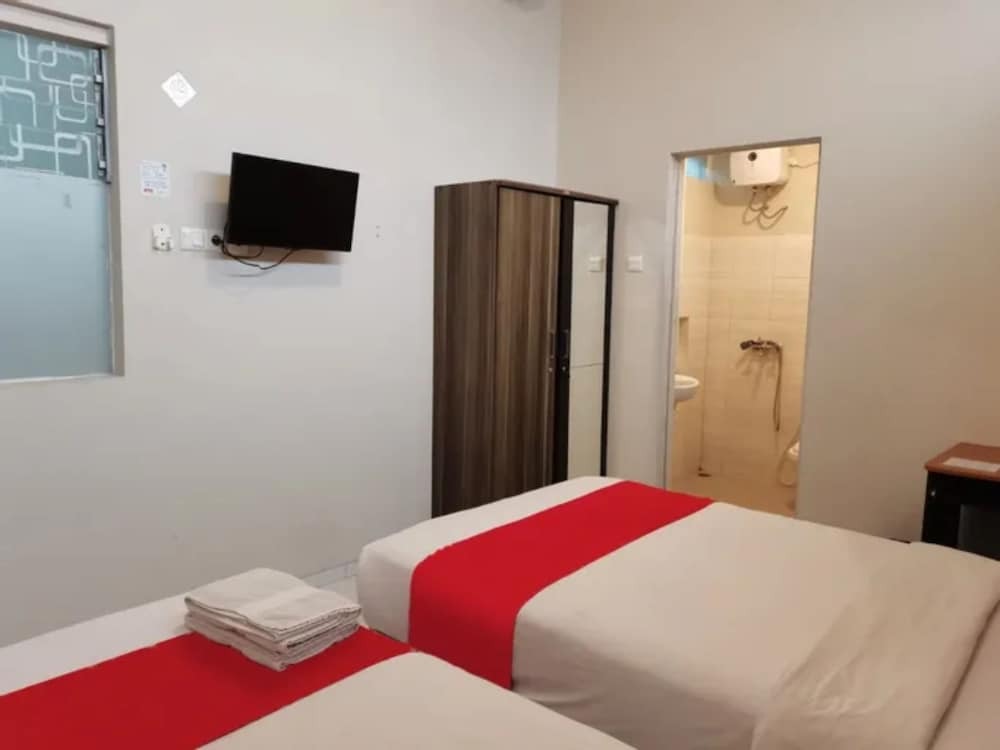 Сурабая: Kozy 15 Guesthouse