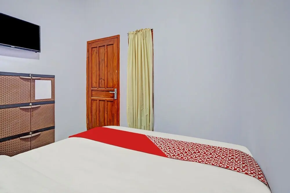 Проболинго: OYO 90604 Menara Sakti Syariah Homestay