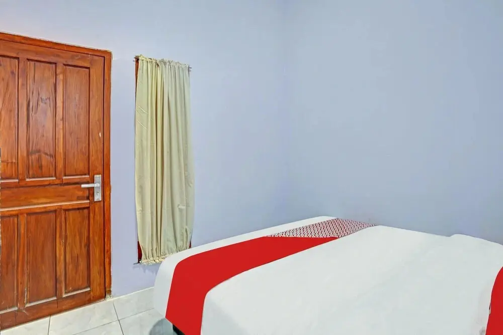 Проболинго: OYO 90604 Menara Sakti Syariah Homestay
