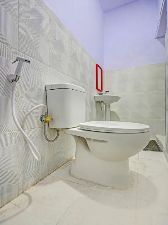 Проболинго: OYO 90604 Menara Sakti Syariah Homestay