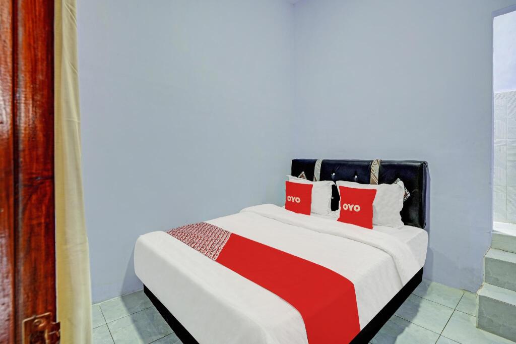 Проболинго: OYO 90604 Menara Sakti Syariah Homestay