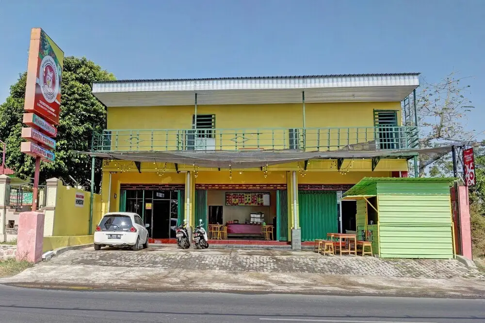 Проболинго: OYO 90604 Menara Sakti Syariah Homestay