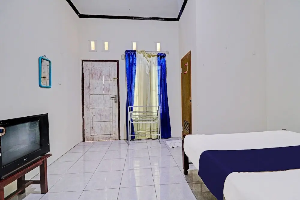Джамби: OYO 92056 Asri Kost Syariah