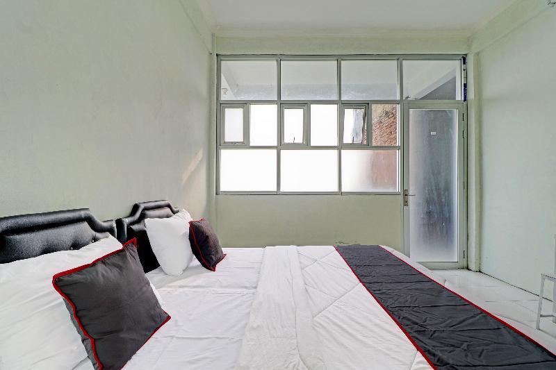 Паромпонг: Capital O 91466 Hotel Neu Backpacker Tf Syariah