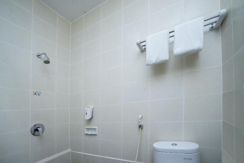 Самаринда: Capital O 1083 Hotel Grand Kartika