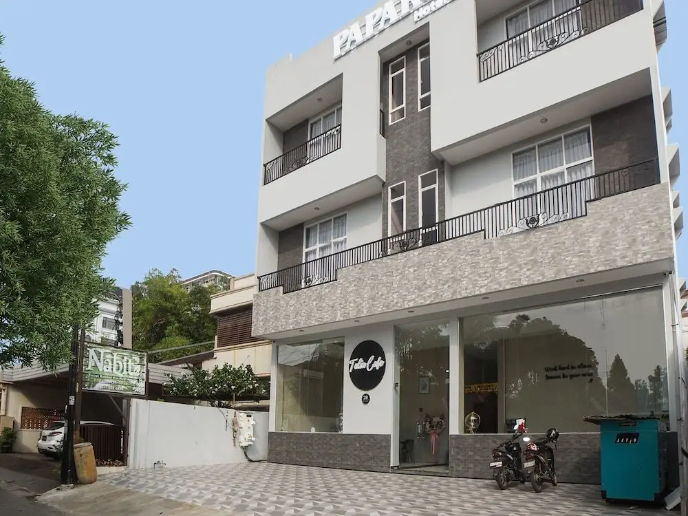 Медан: Super Oyo Capital O Papakoel Hotel & Cafe