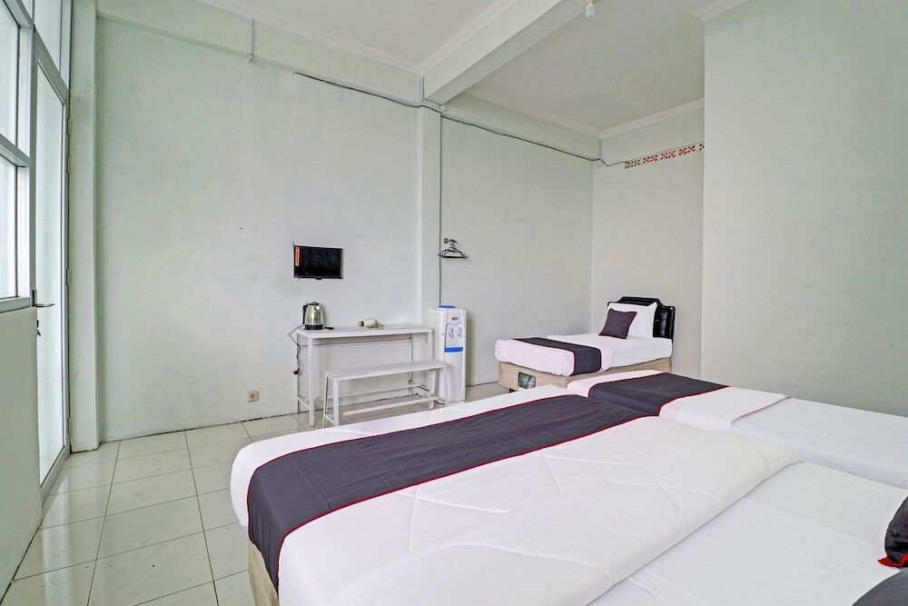 Паромпонг: Capital O 91466 Hotel Neu Backpacker Tf Syariah (smk Tb)