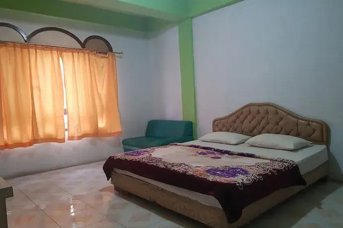 Такенгон: Oyo 93237 Hotel Triarga