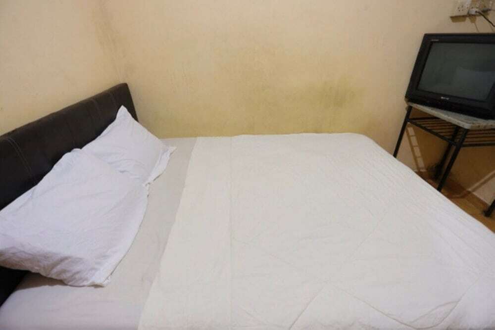 Медан: SPOT ON 93460 Lewi Family Guest House Near GBKP Bangun Mulia Km. 11