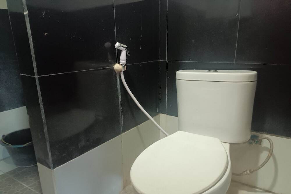 Сентани: OYO 93485 Hotel Kenzie Sentani