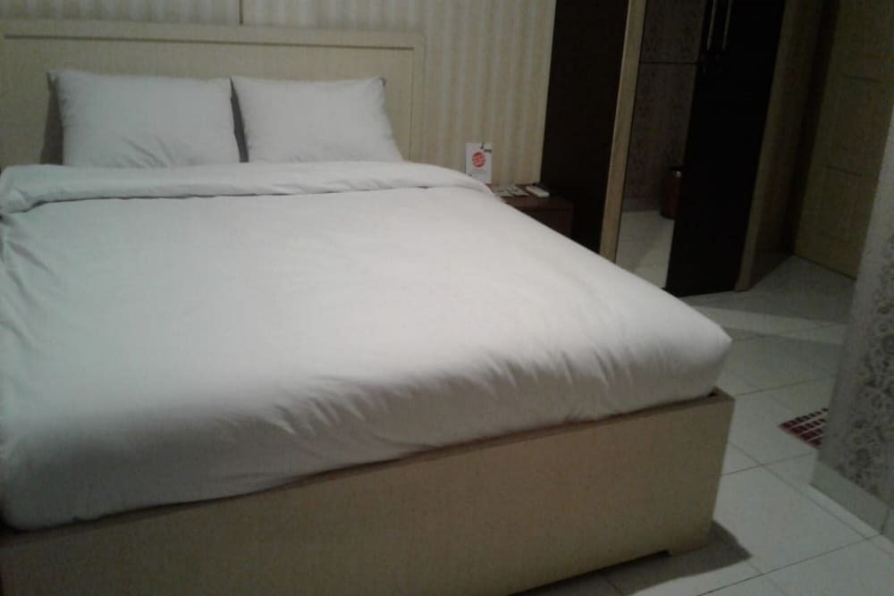 Сентани: OYO 93485 Hotel Kenzie Sentani
