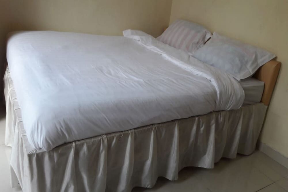 Сентани: OYO 93485 Hotel Kenzie Sentani