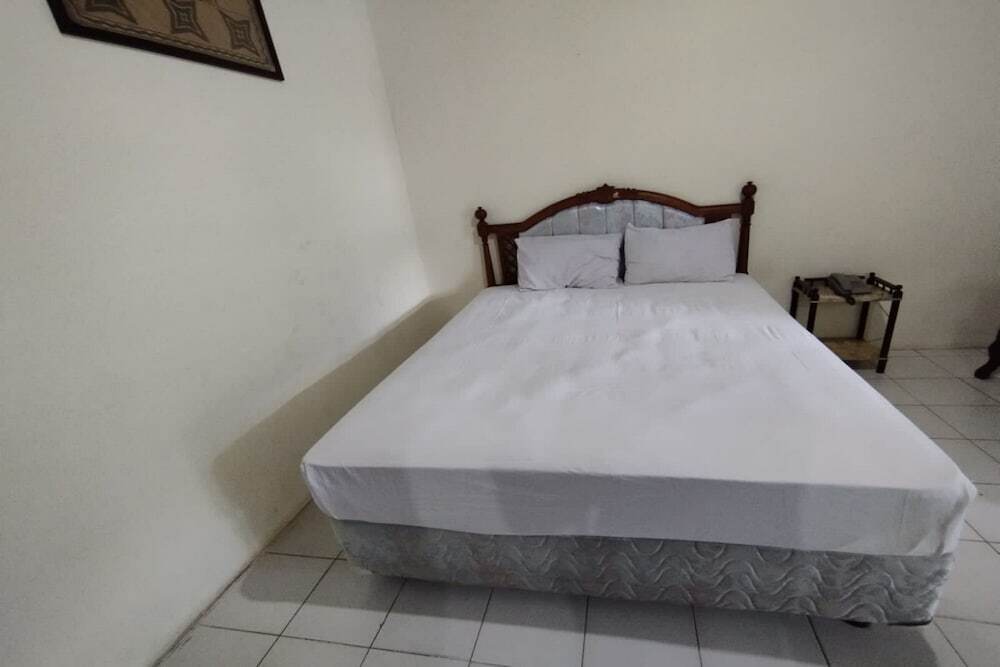 Сентани: OYO 93485 Hotel Kenzie Sentani
