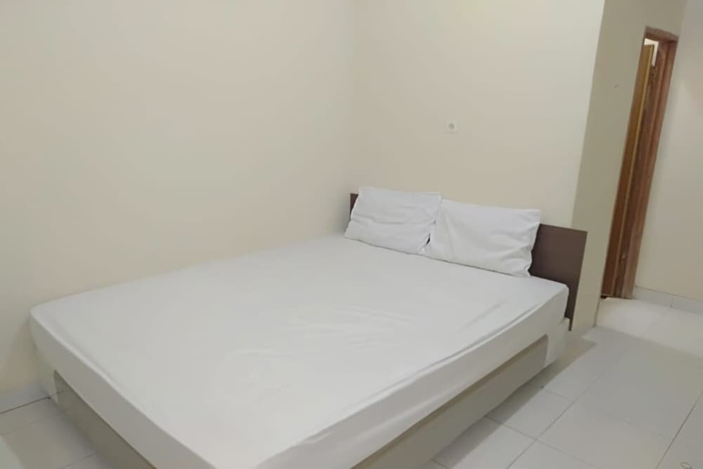 Джамби: SPOT ON 93464 Penginapan Tulimario