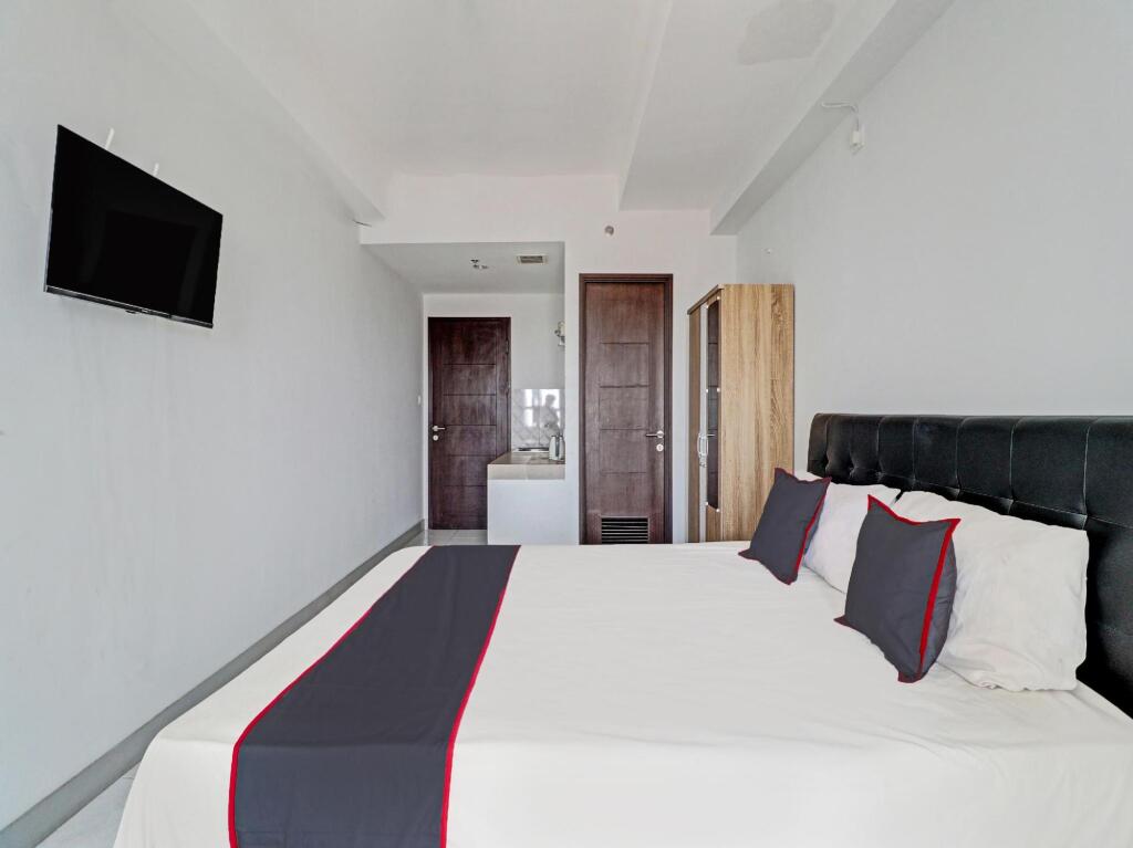 Бандунг: Capital O 92557 Apartemen Mekarwangi Square By Agus