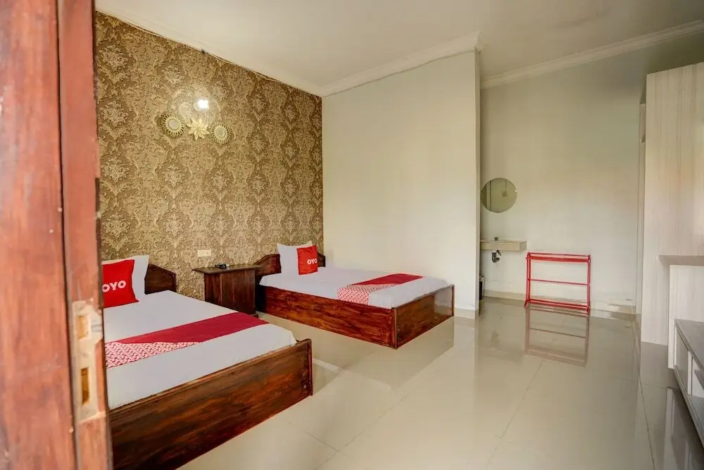 Гресик: OYO 92907 Miranda Hotel Syariah
