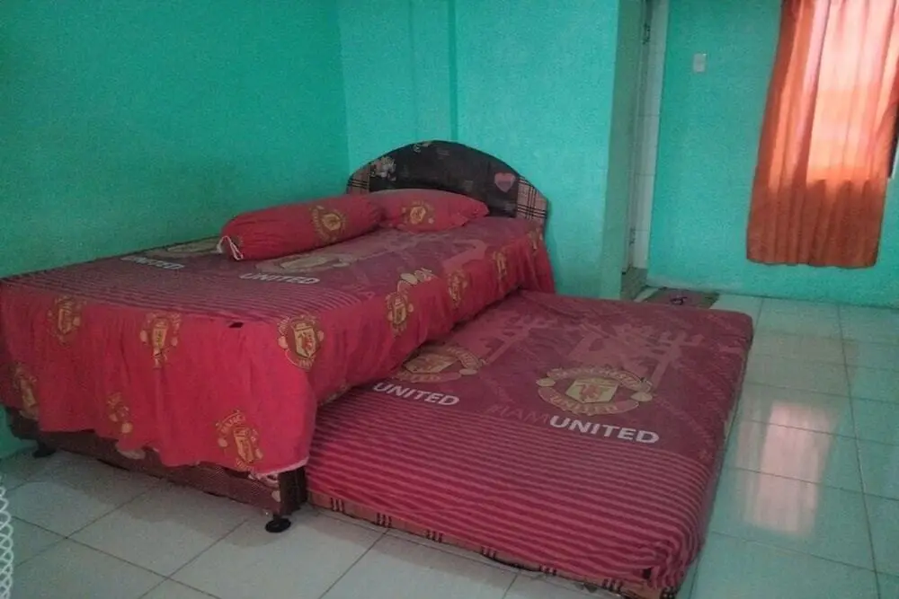 Медан: SPOT ON 92839 Nany Asoka Syariah Near Anyong Cafe Studio