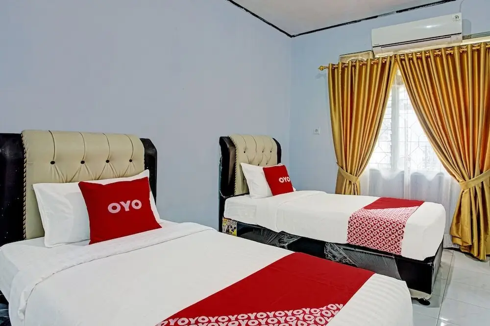 Паданг: OYO 92265 Maqomi Homestay Syariah