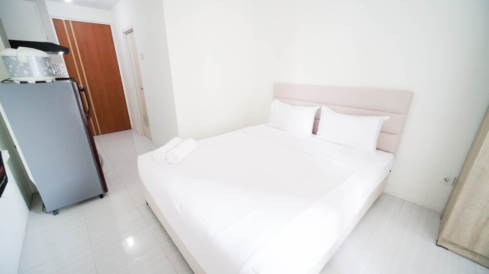 Сурабая: Compact And Tidy Studio At Puncak Dharmahusada Apartment