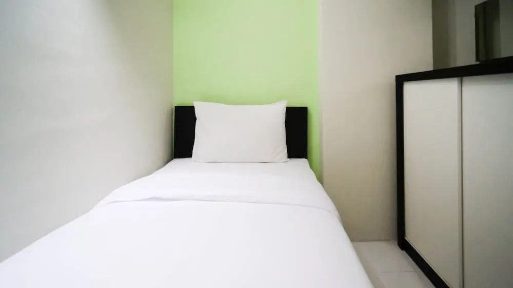 Сурабая: Simple And Homey 2Br At Dian Regency Apartment