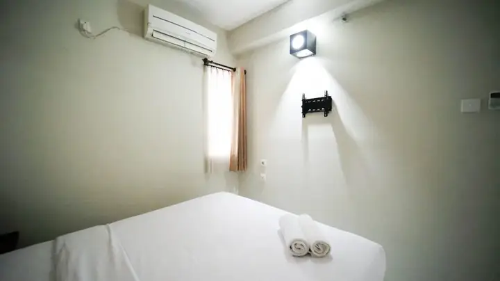 Сурабая: Simple And Homey 2Br At Dian Regency Apartment