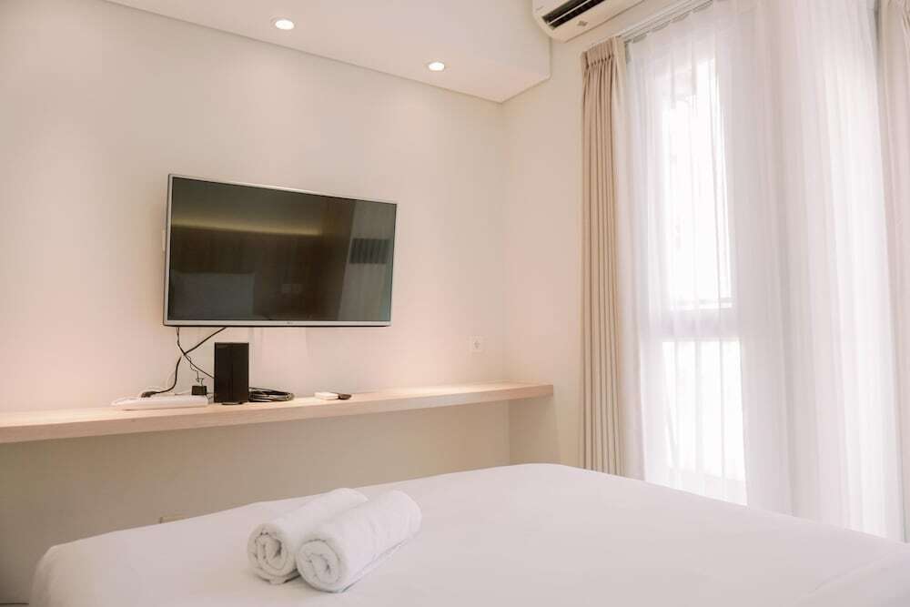 Homey And Warm Studio Amazana Serpong Apartment — фото 1