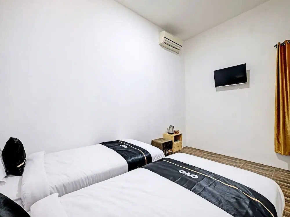 Слеман: Capital O 92963 Global House Syariah
