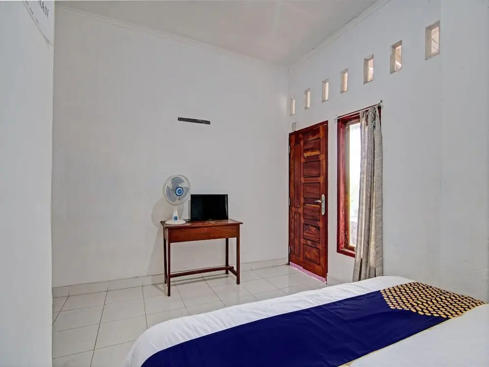 Пеканбару: SPOT ON 92914 Meranti HomestayNearJembatan Siak