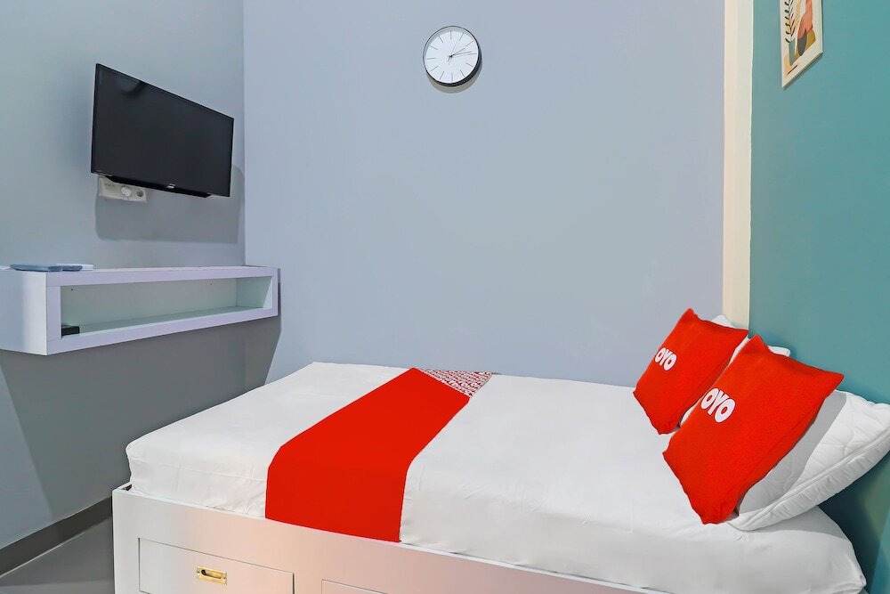 Джамби: OYO Life 92691 Mc Kost Syariah