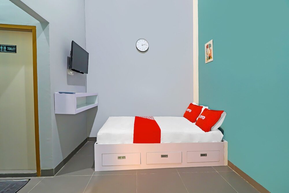 Джамби: OYO Life 92691 Mc Kost Syariah