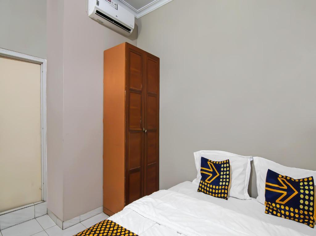 Пеканбару: SPOT ON 91958 Flamboyan 25 Homestay Syariah