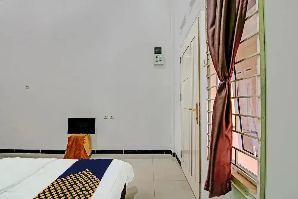 Пеканбару: SPOT ON 92255 Lucky Guesthouse