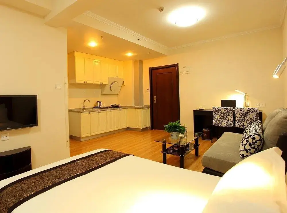 Циндао: Qingdao Xinlong Holiday Apartment