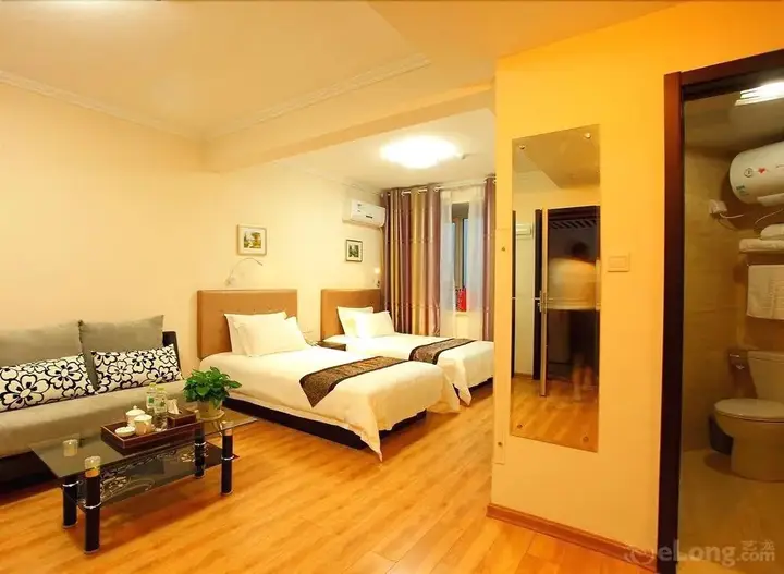 Циндао: Qingdao Xinlong Holiday Apartment