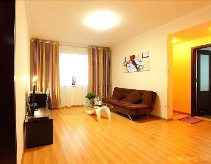 Циндао: Qingdao Xinlong Holiday Apartment